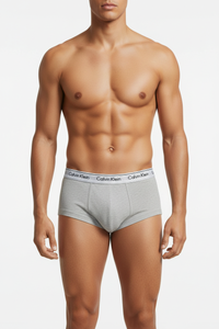 Calvin Klein Cotton Classic 4-Pack Brief NB4000 Heather Grey wearing the men
